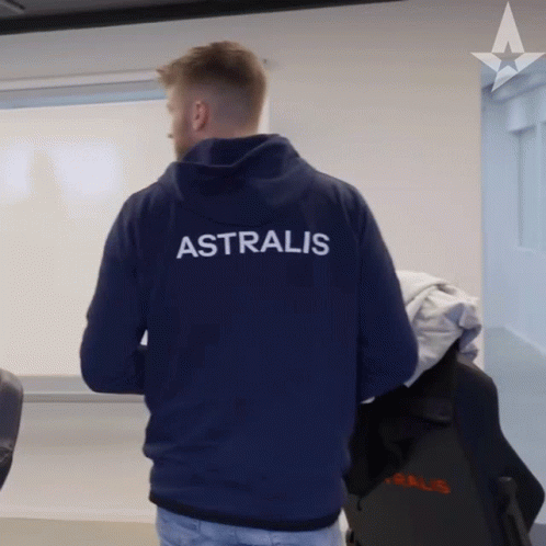 A Man Wearing A Blue Hoodie With The Word Astralis On The Back GIF