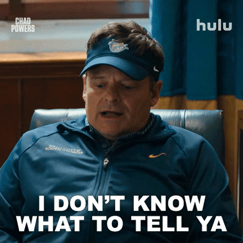 A Man Wearing A Blue Jacket And A Hat Says I Don 'T Know What To Tell Ya GIF
