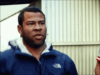 A Man Wearing A Blue Jacket That Says The North Face On It GIF