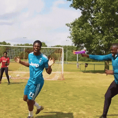 A Man Wearing A Blue Jeep Jersey Is Holding A Frisbee GIF