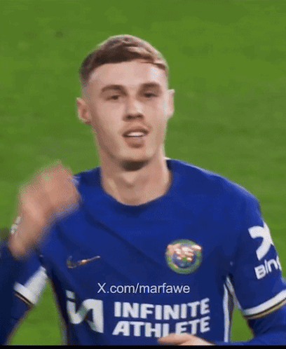 A Man Wearing A Blue Jersey That Says Infinity Athlete GIF
