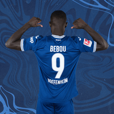 A Man Wearing A Blue Jersey With The Number 9 On The Back GIF