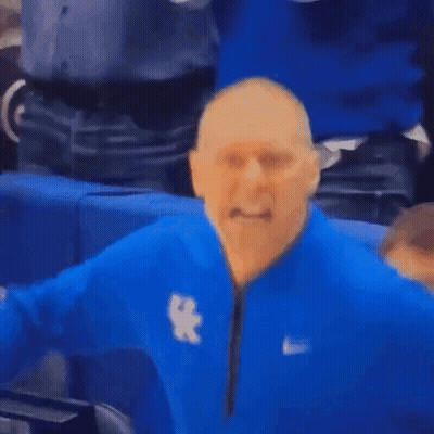 A Man Wearing A Blue Nike Jacket With The Letter X On The Front GIF