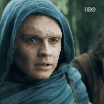 A Man Wearing A Blue Scarf And A Hood With Hbo On The Bottom Right GIF