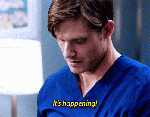 Man In Blue Scrub Top Saying It's Happening GIF