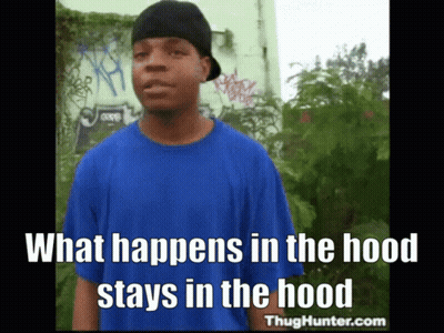 A Man Wearing A Blue Shirt And A Black Hat Says What Happens In The Hood GIF