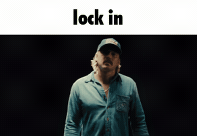 A Man Wearing A Blue Shirt And A Hat Says Lock In GIF
