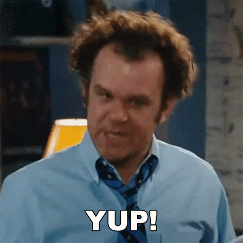 A Man Wearing A Blue Shirt And Tie Is Saying Yup . GIF