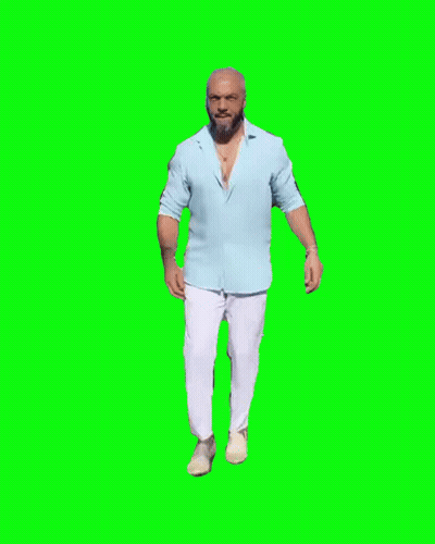 A Man Wearing A Blue Shirt And White Pants Is Dancing On A Green Screen . GIF