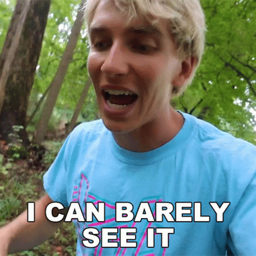 A Man Wearing A Blue Shirt Says I Can Barely See It GIF