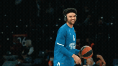 A Man Wearing A Blue Shirt That Says 42 On It GIF