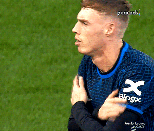 A Man Wearing A Blue Shirt That Says Bingx GIF