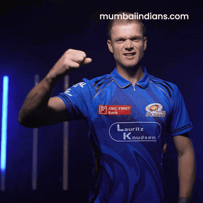 A Man Wearing A Blue Shirt That Says Mumbai Indians GIF