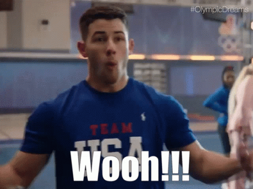 A Man Wearing A Blue Shirt That Says Team Usa Wooh !!! GIF