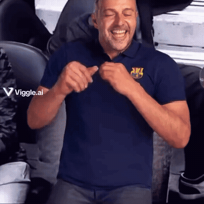 A Man Wearing A Blue Shirt With A Fcb Logo On It Is Laughing GIF