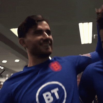 A Man Wearing A Blue Shirt With Bt Written On It GIF