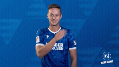 A Man Wearing A Blue Shirt With Ksc On It GIF