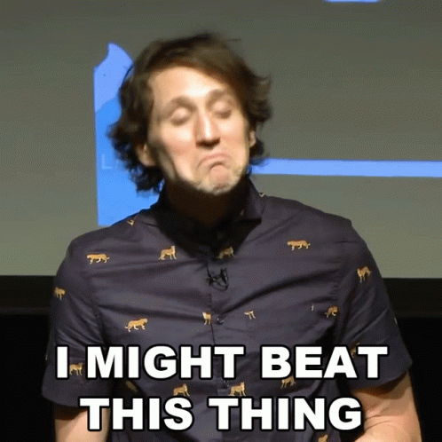 A Man Wearing A Blue Shirt With Leopards On It Says I Might Beat This Thing GIF