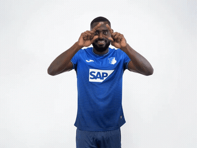 A Man Wearing A Blue Shirt With Sap On It GIF
