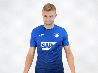 A Man Wearing A Blue Shirt With Sap On It GIF