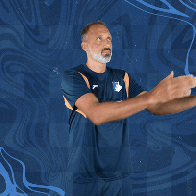 A Man Wearing A Blue Shirt With Sap On It GIF