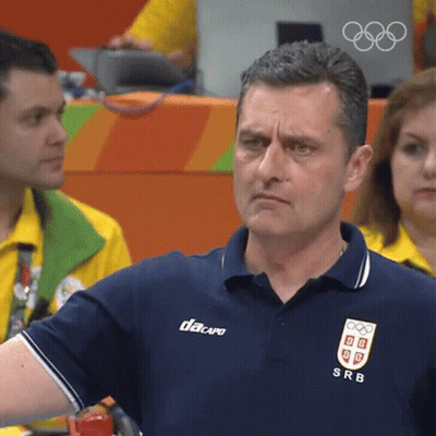 A Man Wearing A Blue Shirt With Srb On The Front GIF