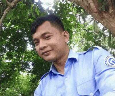 A Man Wearing A Blue Shirt With The Letter G On The Shoulder GIF
