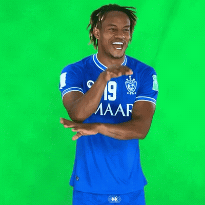 A Man Wearing A Blue Shirt With The Number 19 On The Front GIF