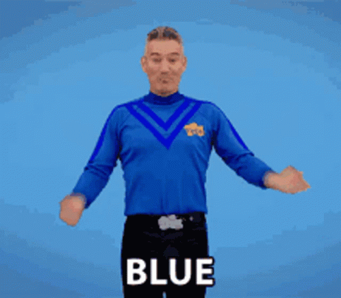 A Man Wearing A Blue Shirt With The Word Blue On The Front GIF
