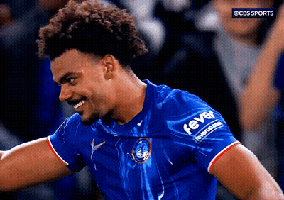 A Man Wearing A Blue Shirt With The Word Fever On The Sleeve GIF