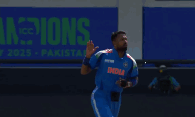 A Man Wearing A Blue Shirt With The Word Indu On The Front GIF