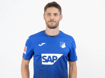 A Man Wearing A Blue Shirt With The Word Sap On It Gives Two Thumbs Up GIF