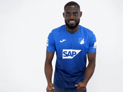 A Man Wearing A Blue Shirt With The Word Sap On The Front GIF