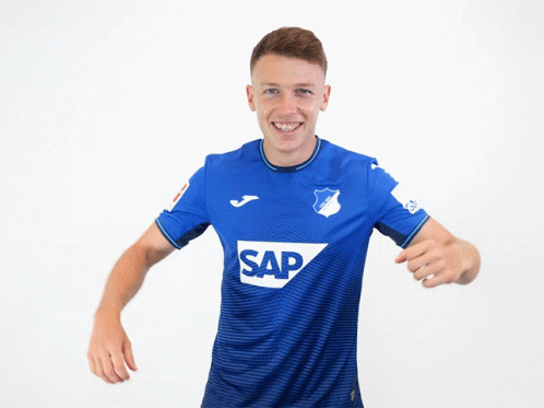 A Man Wearing A Blue Shirt With The Word Sap On The Front GIF