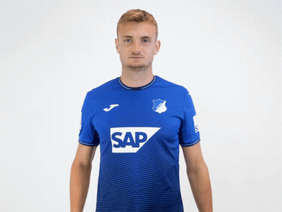 A Man Wearing A Blue Shirt With The Word Sap On The Front GIF