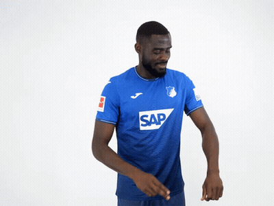 A Man Wearing A Blue Shirt With The Word Sap On The Front GIF