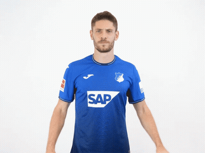 A Man Wearing A Blue Shirt With The Word Sap On The Front GIF