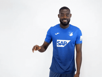 A Man Wearing A Blue Shirt With The Word Sap On The Front GIF