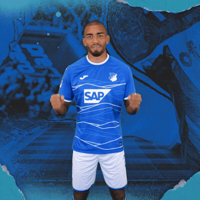 A Man Wearing A Blue Shirt With The Word Sap On The Front GIF