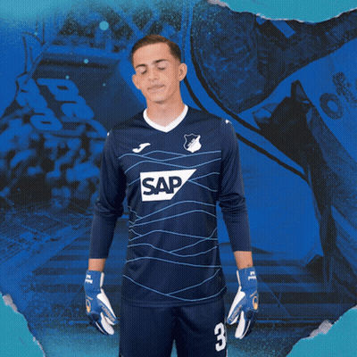 A Man Wearing A Blue Shirt With The Word Sap On The Front GIF