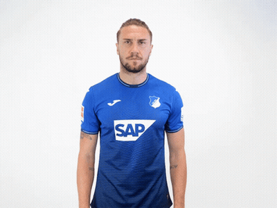 A Man Wearing A Blue Shirt With The Word Sap On The Front GIF