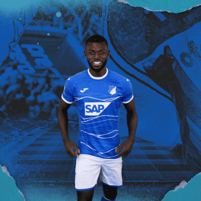 A Man Wearing A Blue Shirt With The Word Sap On The Front GIF