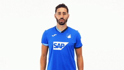 A Man Wearing A Blue Shirt With The Word Sap On The Front GIF