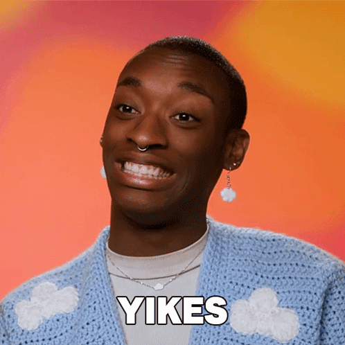 A Man Wearing A Blue Sweater Says Yikes GIF