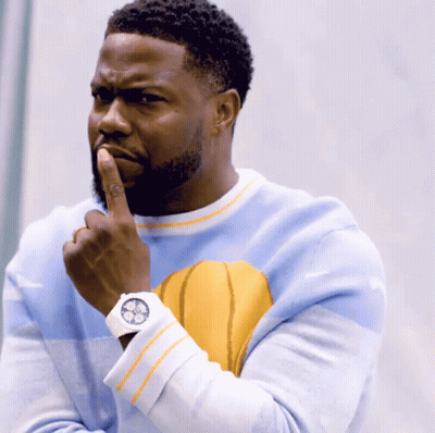 A Man Wearing A Blue Sweater With A Yellow Basketball On It GIF