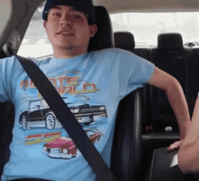A Man Wearing A Blue T-Shirt That Says ' Tc Palo ' On It GIF