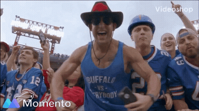 A Man Wearing A Blue Tank Top That Says Buffalo Vs. Everybody GIF