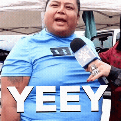 A Man Wearing A Blue Under Armour Shirt Is Being Interviewed By A Woman GIF