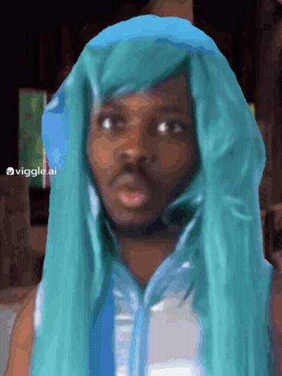 A Man Wearing A Blue Wig And A White Shirt Has The Hashtag Viggles Ai On The Bottom GIF