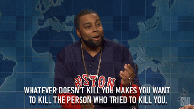 A Man Wearing A Boston Shirt Is Talking GIF
